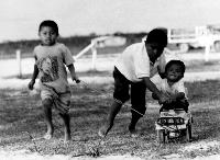 Boys at play in Liwo Riwo